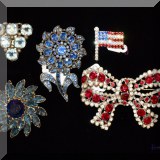 J150. Rhinestone pins.